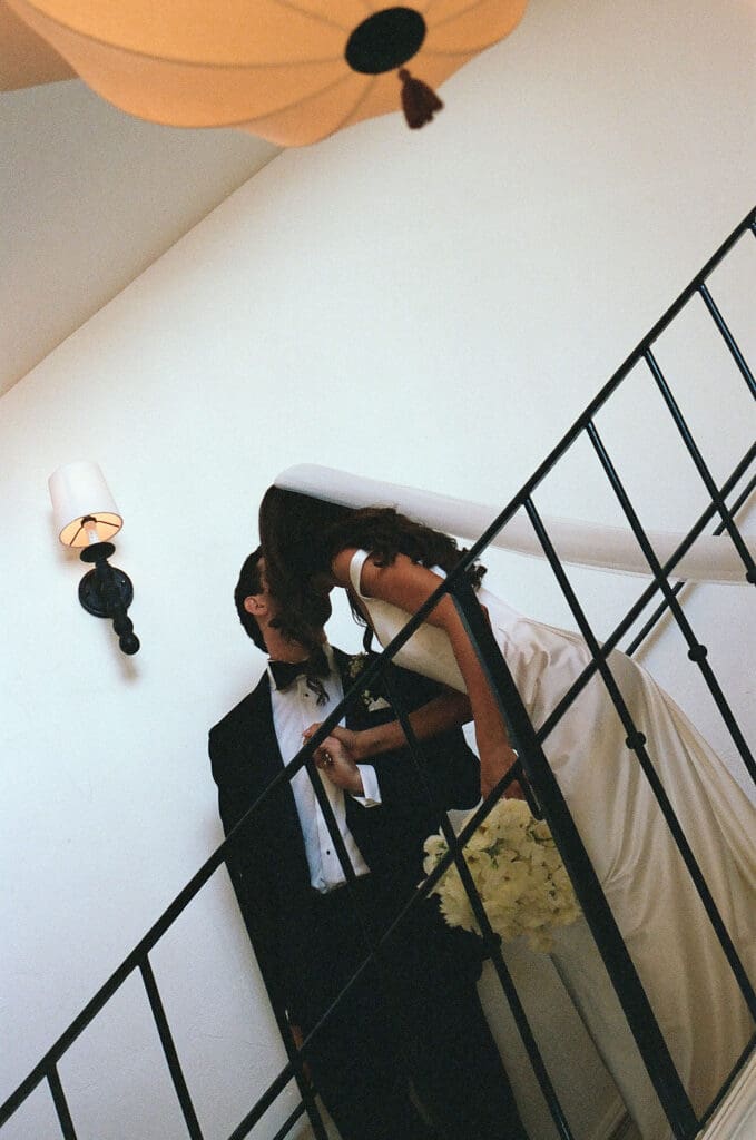 picture of the bride and groom kissing