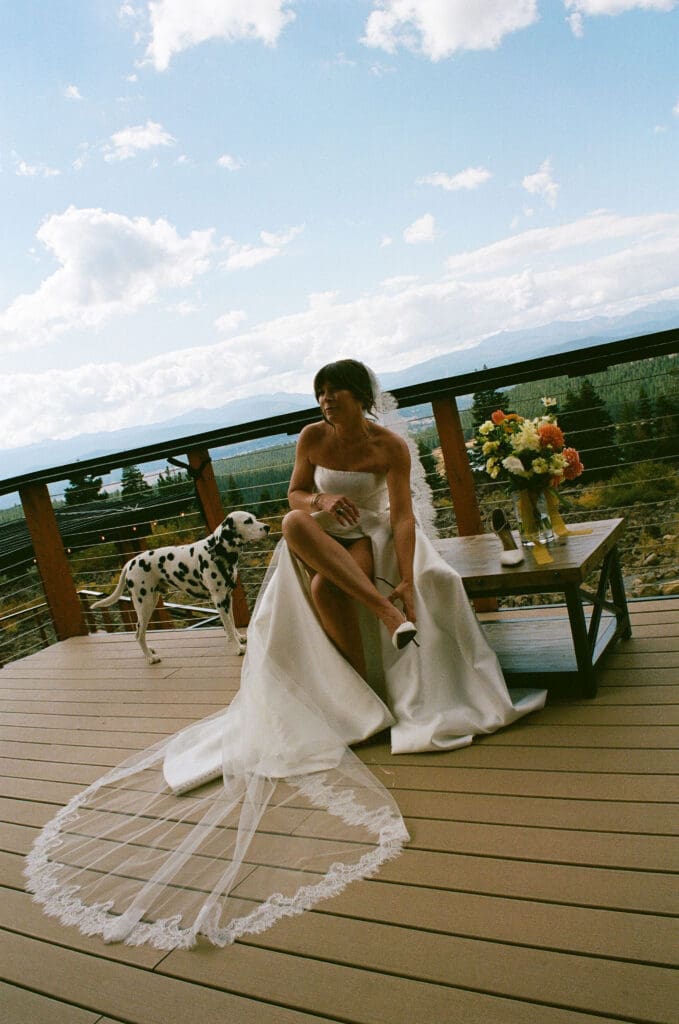 Bride putting on her shoes before the ceremony