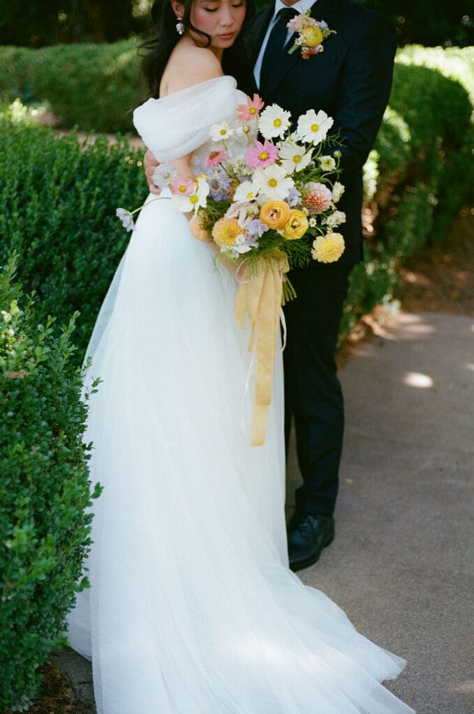 cute picture of the bride and groom hugging