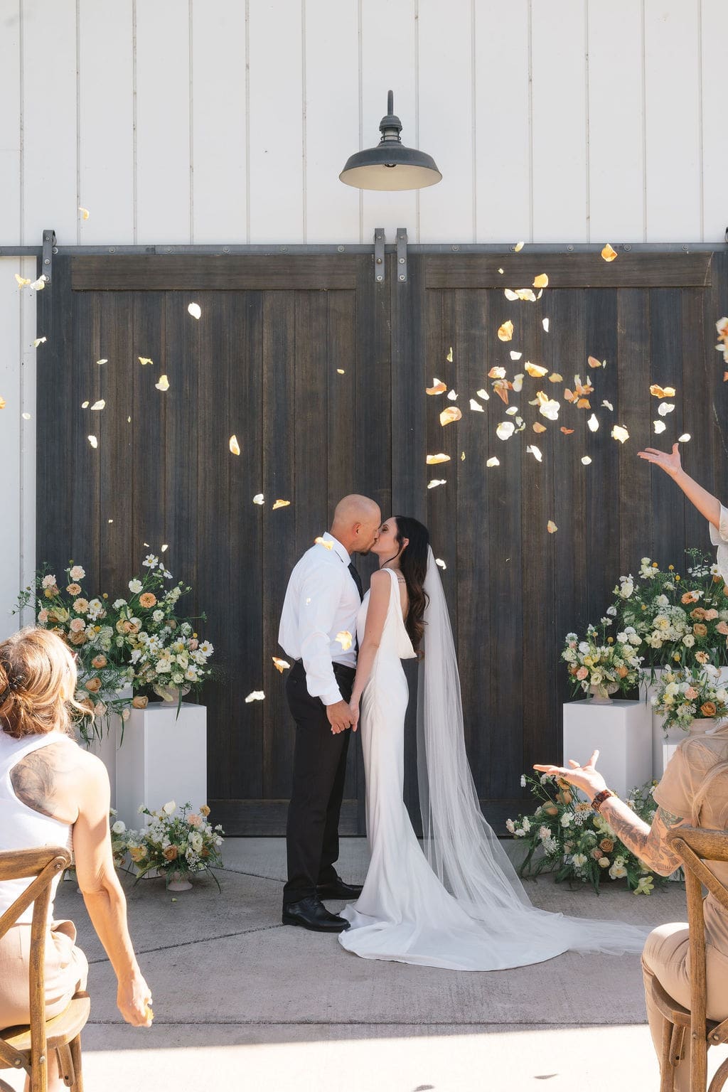 cute picture of the bride and groom kissing